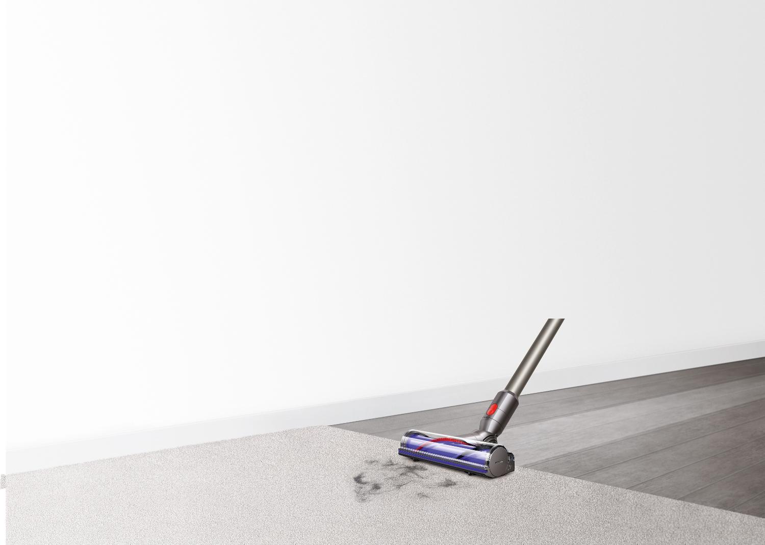 Dyson V8™ vacuums on carpet and hard flooring